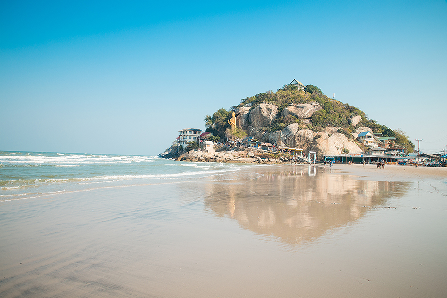 Khao Takiab beach with the rocky headland rising at the southern end of the bay
